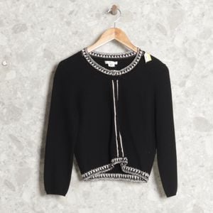 casaco preto paule ka 138944574?action_source=69532&ref=home_home&rsp=1&rspix=1