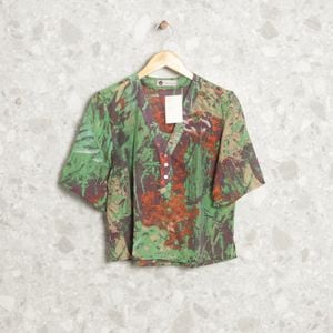 blusa verde e roxa en chemise 127900028?action_source=62833&ref=home_home&rsp=1&rspix=1