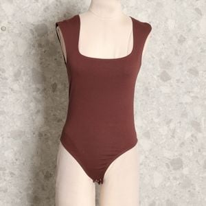 body marrom bluesteel 148151250?action_source=75015&ref=home_home&rsp=1&rspix=1