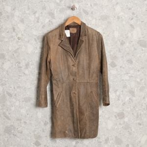 casaco marrom omk 138411845?action_source=69532&ref=home_home&rsp=1&rspix=1