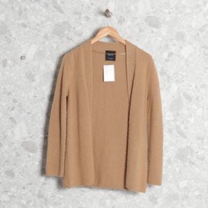 casaco bege trico zara 126237342?action_source=64652&ref=home_home&rsp=1&rspix=1