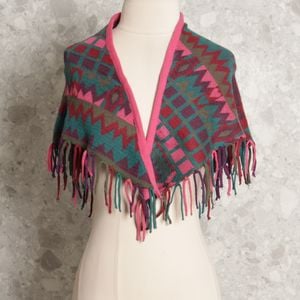 poncho rosa cantao 141342503?action_source=73498&ref=home_home&rsp=1&rspix=1