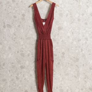 macacao vermelho escuro brilhoso 126297456?action_source=70096&ref=home_home&rsp=1&rspix=1