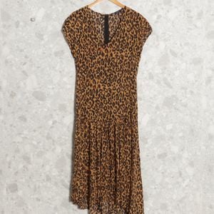 vestido bege animal print zara 144013324?action_source=73031&ref=home_home&rsp=1&rspix=1