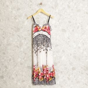 vestido branco floral evase india 131339566?action_source=67322&ref=home_home&rsp=1&rspix=1