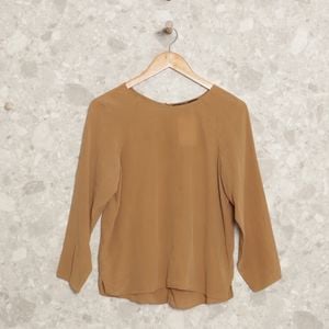 blusa marrom zara 111092354?action_source=72668&ref=home_home&rsp=1&rspix=1
