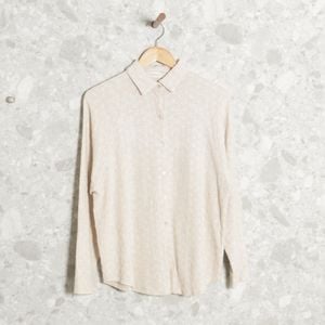 camisa laise manga longa creme makai 141843869?action_source=70754&ref=home_home&rsp=1&rspix=1