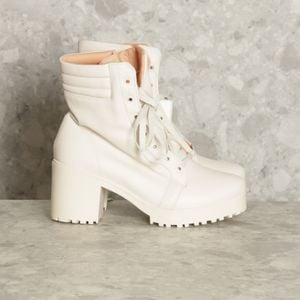 coturno cano medio off white 138512464?action_source=71744&ref=home_home&rsp=1&rspix=1