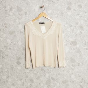 blusa amarela zara 125880242?action_source=70853&ref=home_home&rsp=1&rspix=1