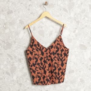 blusa terracota abstrata 136842024?action_source=75241&ref=home_home&rsp=1&rspix=1