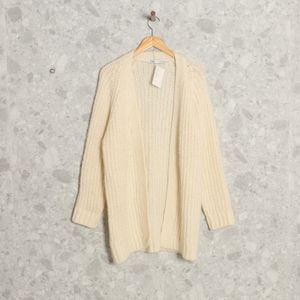 cardigan trico off white zara 140160459?action_source=70358&ref=home_home&rsp=1&rspix=1