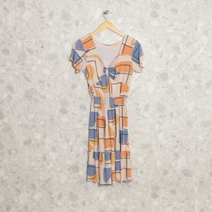 vestido bege geometrico 133096556?action_source=66728&ref=home_home&rsp=1&rspix=1