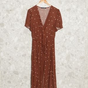 vestido marrom poa clock house 141813312?action_source=70754&ref=home_home&rsp=1&rspix=1
