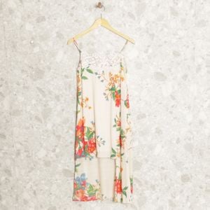 vestido creme floral farm 133298168?action_source=66728&ref=home_home&rsp=1&rspix=1
