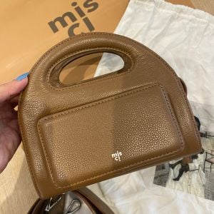 bolsa nine misci marrom 150540927?action_source=76035&ref=home_home&rsp=1&rspix=1