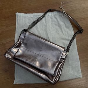 bolsa zara ombro metalizada 147130198?action_source=77124&ref=home_home&rsp=1&rspix=1