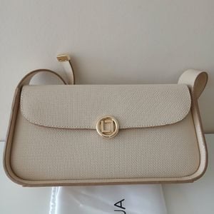 bolsa em couro luz da lua 139387632?action_source=72470&ref=home_home&rsp=1&rspix=1