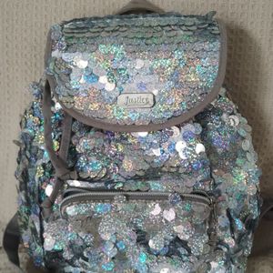 mochila justice usa 132587030?action_source=66794&ref=home_home&rsp=1&rspix=1