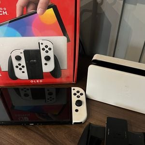 nitendo switch oled 119919998?action_source=56597&ref=home_home&rsp=1&rspix=1