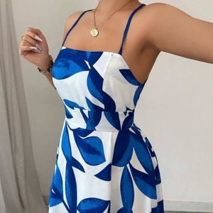 vestido longo elenzga estampado azul e branco 139923925?action_source=31319&ref=home_home&rsp=1&rspix=1