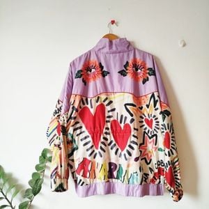 jaqueta farm g corta vento festa do amor oversized lilas branca coracao estampada windbreaker 150509032?action_source=76563&ref=home_home&rsp=1&rspix=1