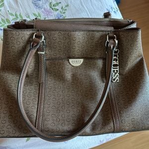 bolsa de couro guess marrom original 147595984?action_source=76594&ref=home_home&rsp=1&rspix=1