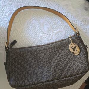 bolsa victor hugo 133945129?action_source=68872&ref=home_home&rsp=1&rspix=1