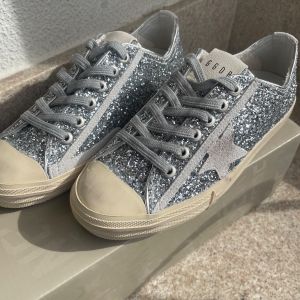 tenis golden goose 120695440?action_source=31946&ref=home_home&rsp=1&rspix=1