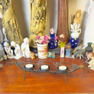 elegante porta velas em metal 130248778?action_source=66529&ref=home_home&rsp=1&rspix=1