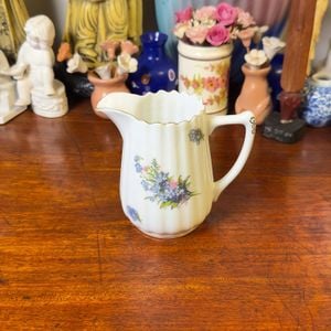 cremeira porcelana utinga 131100631?action_source=66529&ref=home_home&rsp=1&rspix=1