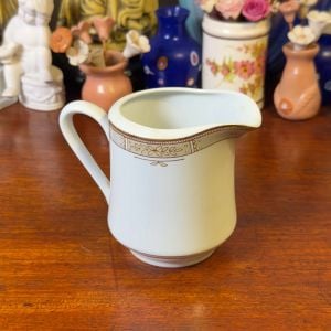 cremeira em porcelana schmidt 130421112?action_source=66529&ref=home_home&rsp=1&rspix=1