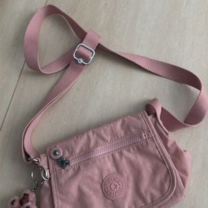 mini bolsa transversal kipling sabian rosa 149804375?action_source=72470&ref=home_home&rsp=1&rspix=1