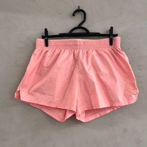 shorts nike feminino rosa p 146547648?action_source=75208&ref=home_home&rsp=1&rspix=1
