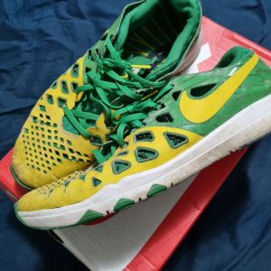 tenis nike verde e amarelo 43 145272952?action_source=76398&ref=home_home&rsp=1&rspix=1