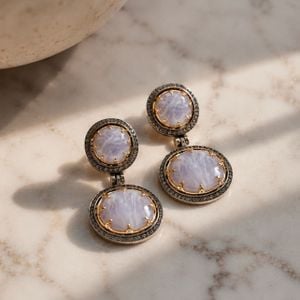 brinco feminino lavanda com efeito cristalino 150273898?action_source=76396&ref=home_home&rsp=1&rspix=1