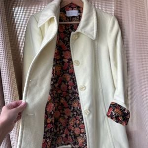 casaco de la 126619232?action_source=70094&ref=home_home&rsp=1&rspix=1