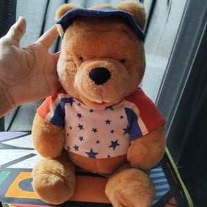 pelucia urso pooh disney 142185514?action_source=72107&ref=home_home&rsp=1&rspix=1
