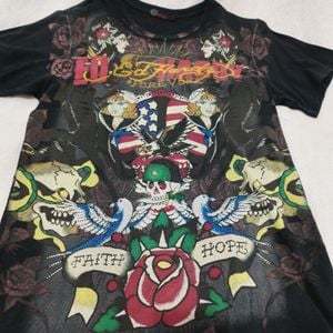 camiseta ed hardy preta pedraria 141696536?action_source=72701&ref=home_home&rsp=1&rspix=1