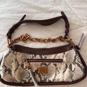 bolsa steve madden ombro snake print 143930973?action_source=64648&ref=home_home&rsp=1&rspix=1