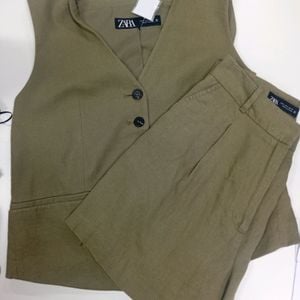 conjunto zara colete e shorts linho p 149584911?action_source=77124&ref=home_home&rsp=1&rspix=1