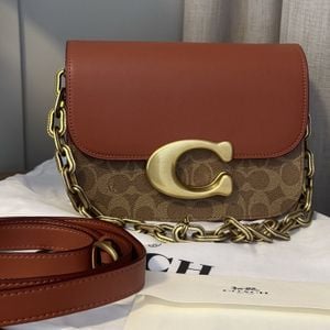 bolsa coach idol signature marrom 138433160?action_source=68872&ref=home_home&rsp=1&rspix=1