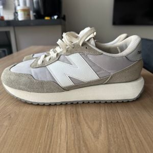 tenis new balance 237 branco cinza n39 148297239?action_source=72470&ref=home_home&rsp=1&rspix=1