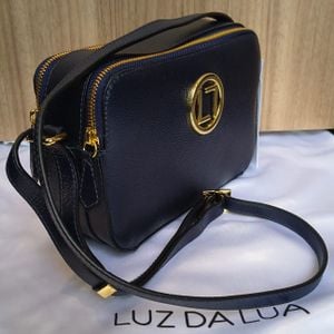 bolsa tira colo luz da lua em couro azul marinho 145090747?action_source=73496&ref=home_home&rsp=1&rspix=1
