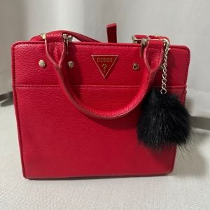 bolsa vermelha com pompom 128482174?action_source=71545&ref=home_home&rsp=1&rspix=1