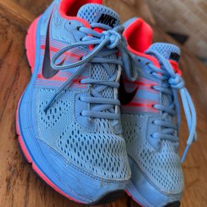 tenis nike pegasus 29 azul e vermelho 36 145255624?action_source=75208&ref=home_home&rsp=1&rspix=1