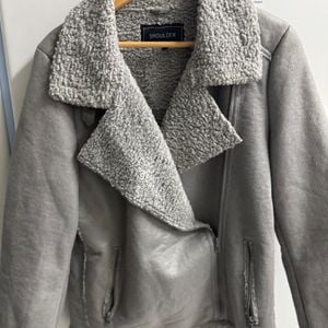 jaqueta de frio shoulder 127044089?action_source=71480&ref=home_home&rsp=1&rspix=1