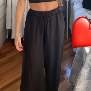 calca pantalona preta 134930245?action_source=67884&ref=home_home&rsp=1&rspix=1