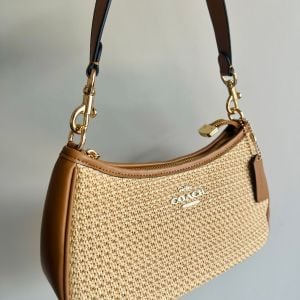 bolsa coach teri palha e couro 150232522?action_source=72470&ref=home_home&rsp=1&rspix=1