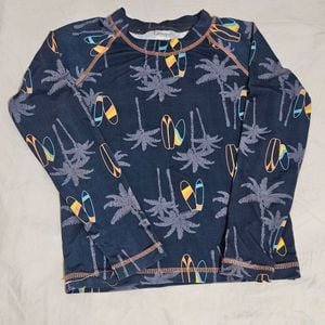 camisa praia manga longa menino 139922813?action_source=70721&ref=home_home&rsp=1&rspix=1