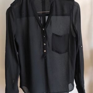 camisa preta fluida m 117745029?action_source=75542&ref=home_home&rsp=1&rspix=1